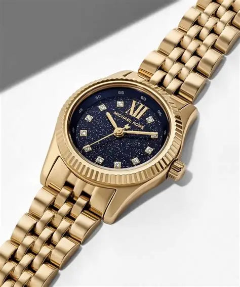 Michael Kors Lexington avec cadran bleu et bracelet en acier doré pour femme MK4802